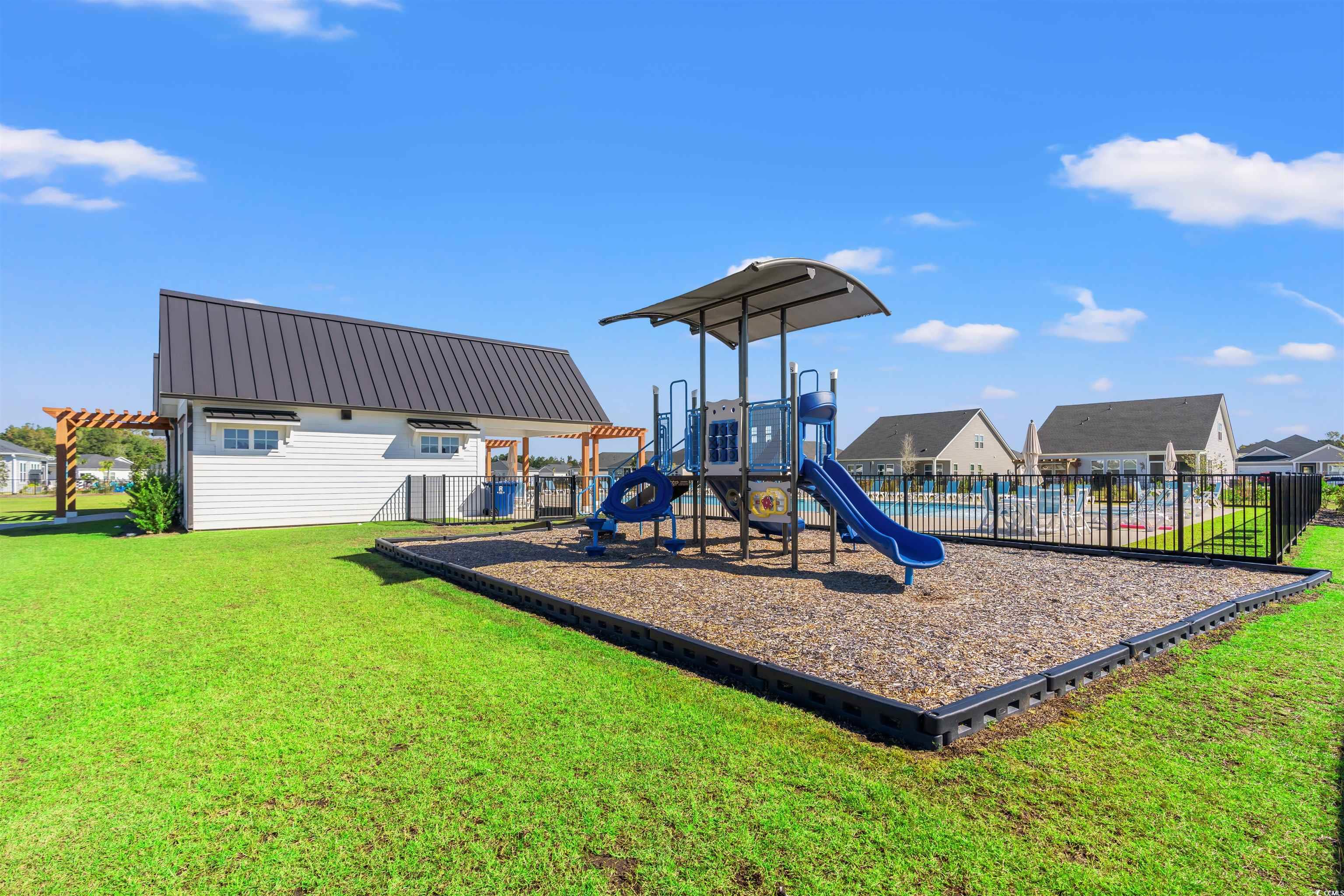 1546 Regal Fern Way Longs, SC 29568 - Photo 31 of 34 Communal playground with a residential view