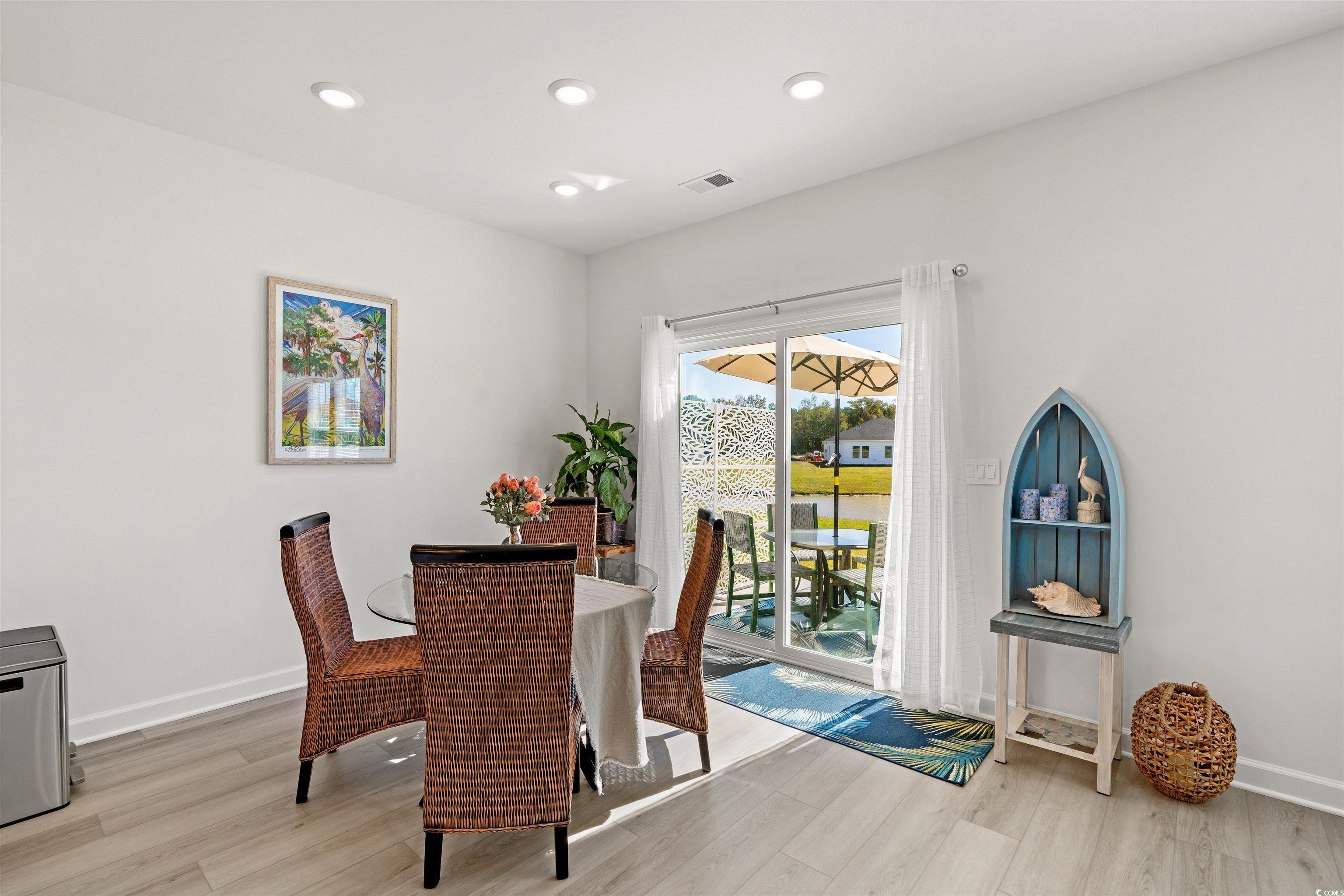 1546 Regal Fern Way Longs, SC 29568 - Photo 7 of 34 Dining area featuring recessed lighting and light wood-style floors