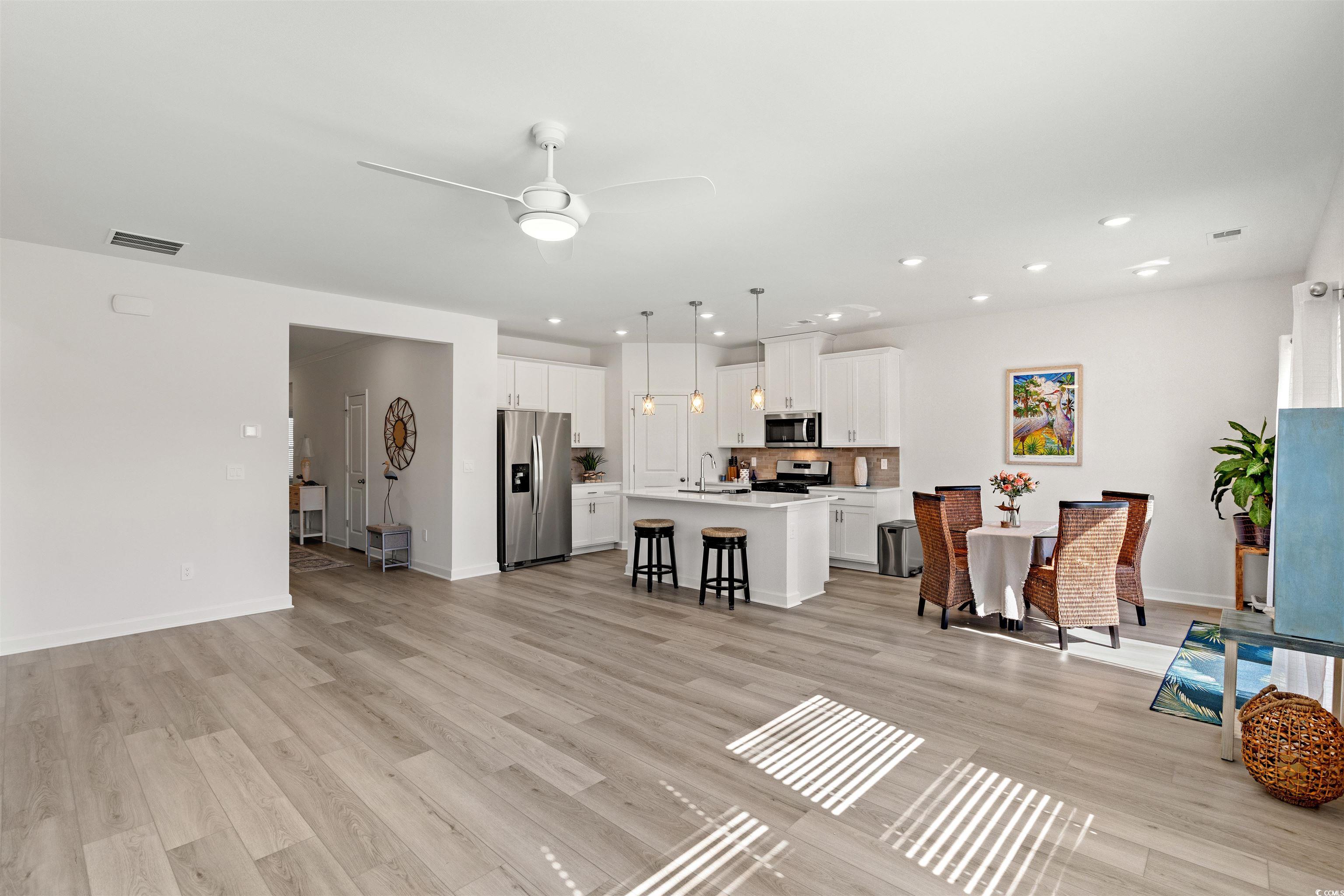 1546 Regal Fern Way Longs, SC 29568 - Photo 8 of 34 Living room featuring light wood-type flooring, ceiling fan, and recessed lighting