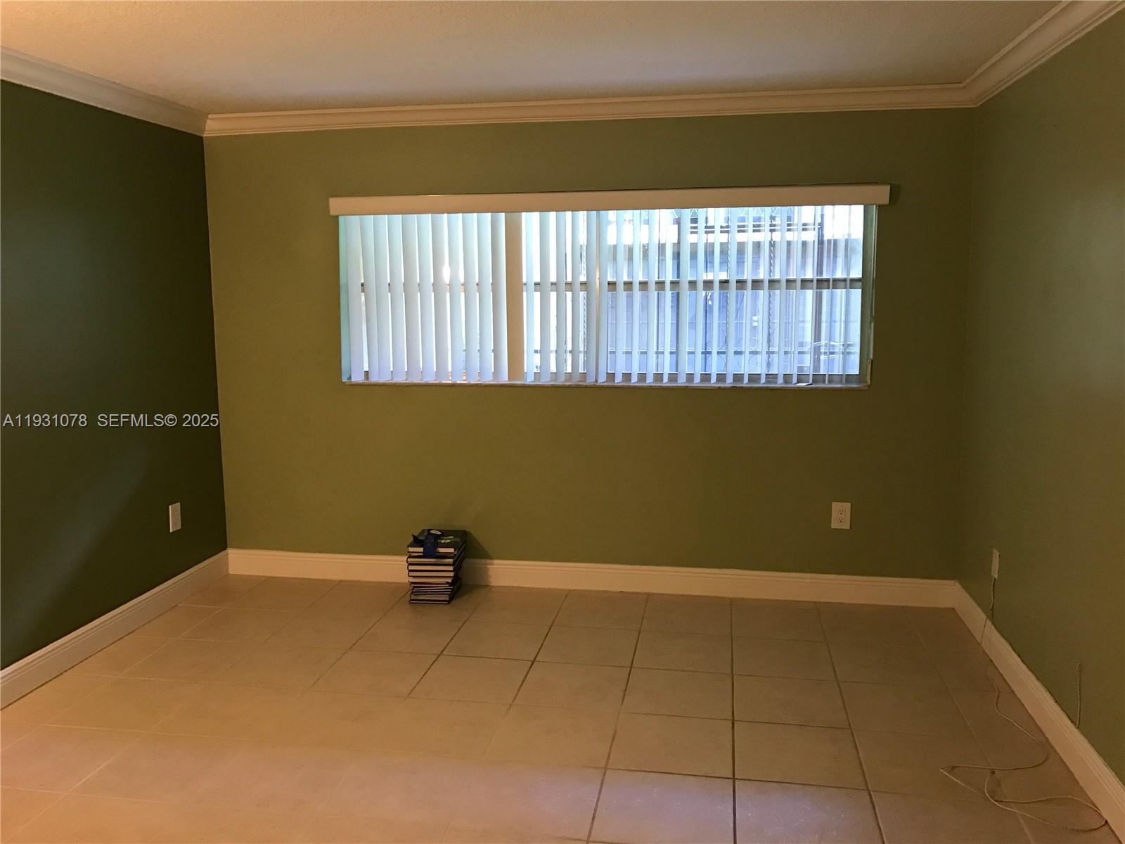 100 Northwest 87th Avenue, Unit E102 Miami, FL 33172 - Photo 12 of 17 a view of a room with a large window