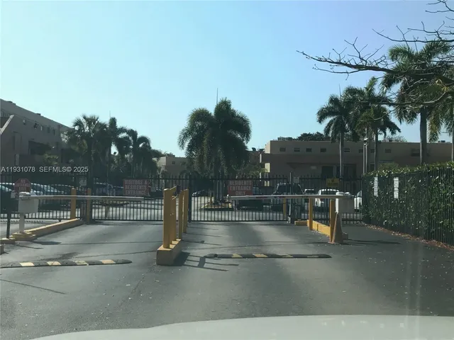 a view of a swimming pool with a table and chairs