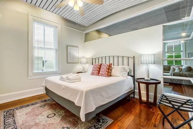 a view of an entryway with wooden floor