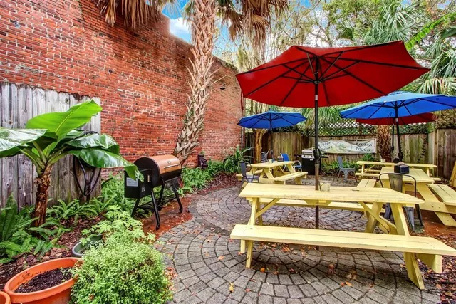 a view of a swimming pool with a patio