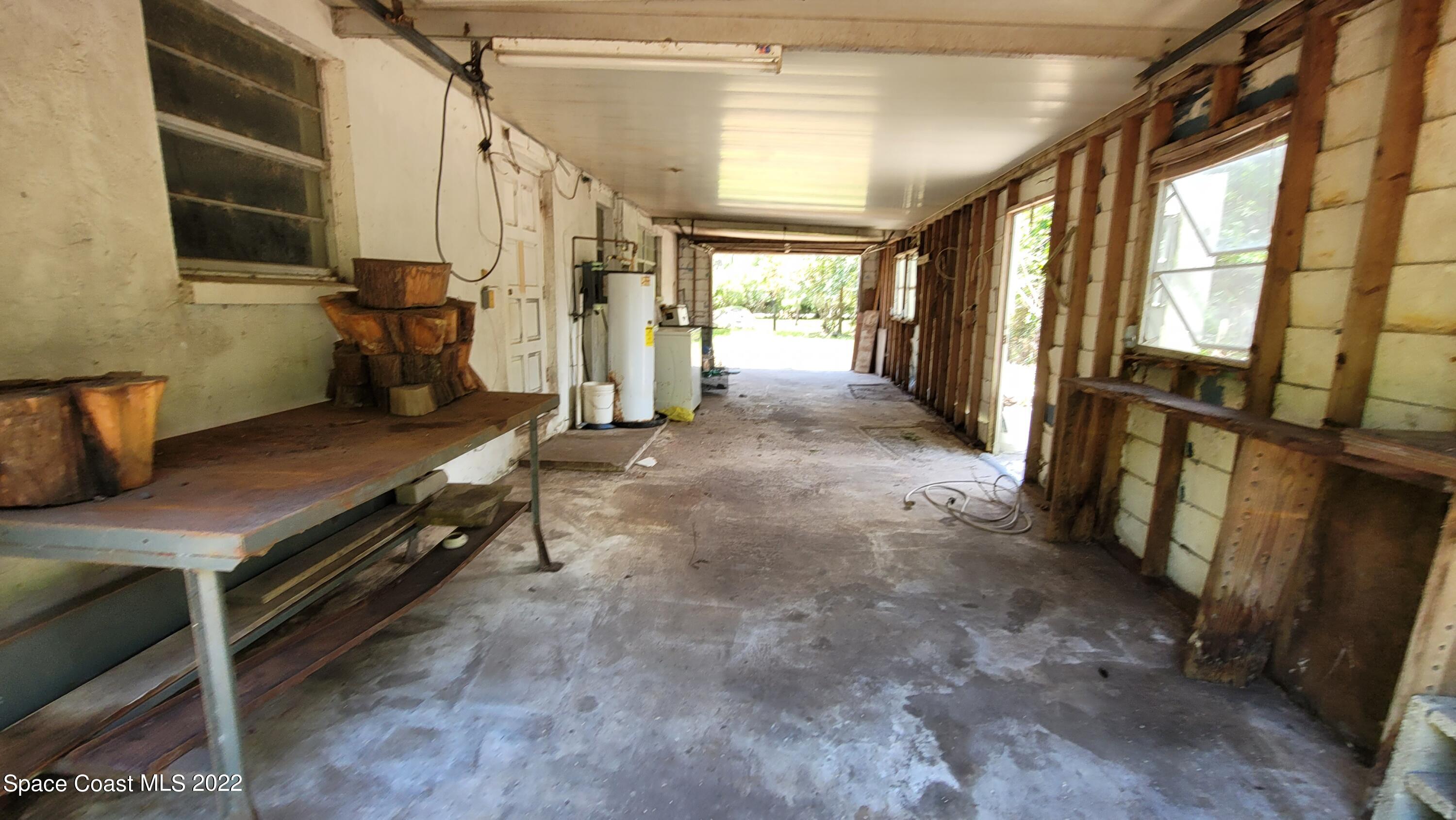 1910 Atz Road Malabar, FL 32950 - Photo 16 of 58 a view of an empty room with a window
