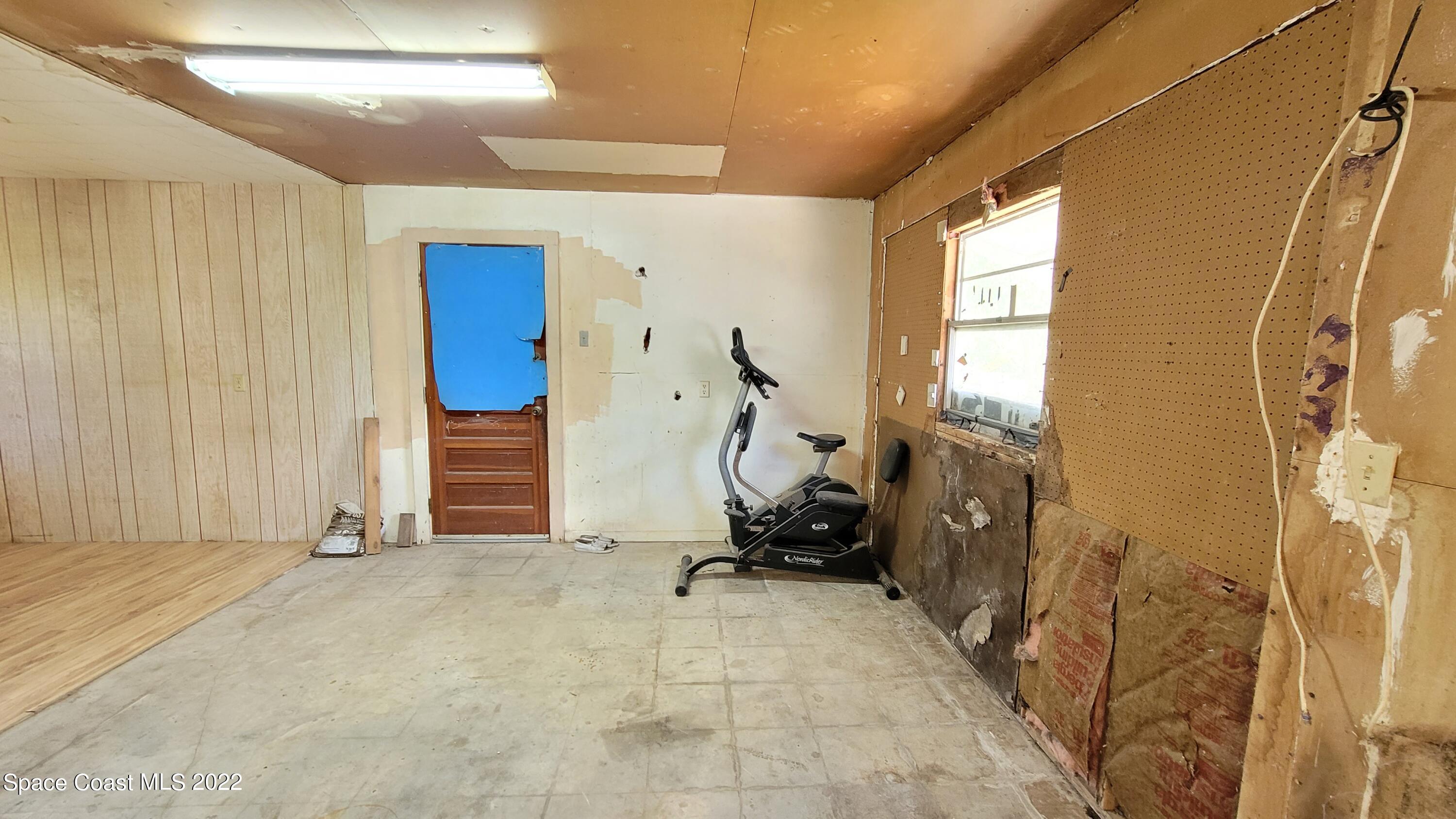 1910 Atz Road Malabar, FL 32950 - Photo 42 of 58 a view of a room with gym equipment