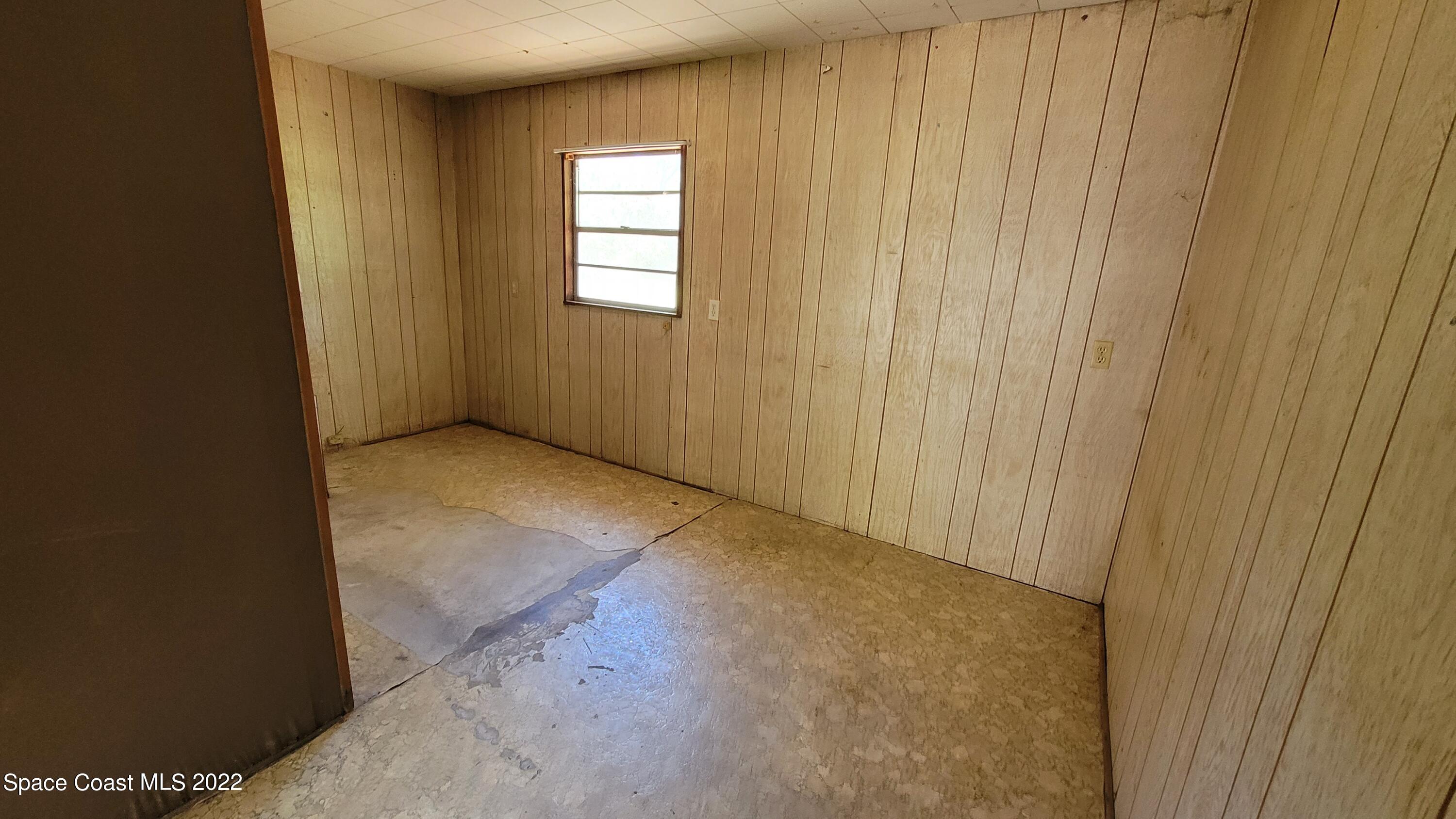 1910 Atz Road Malabar, FL 32950 - Photo 46 of 58 a view of an empty room with a window