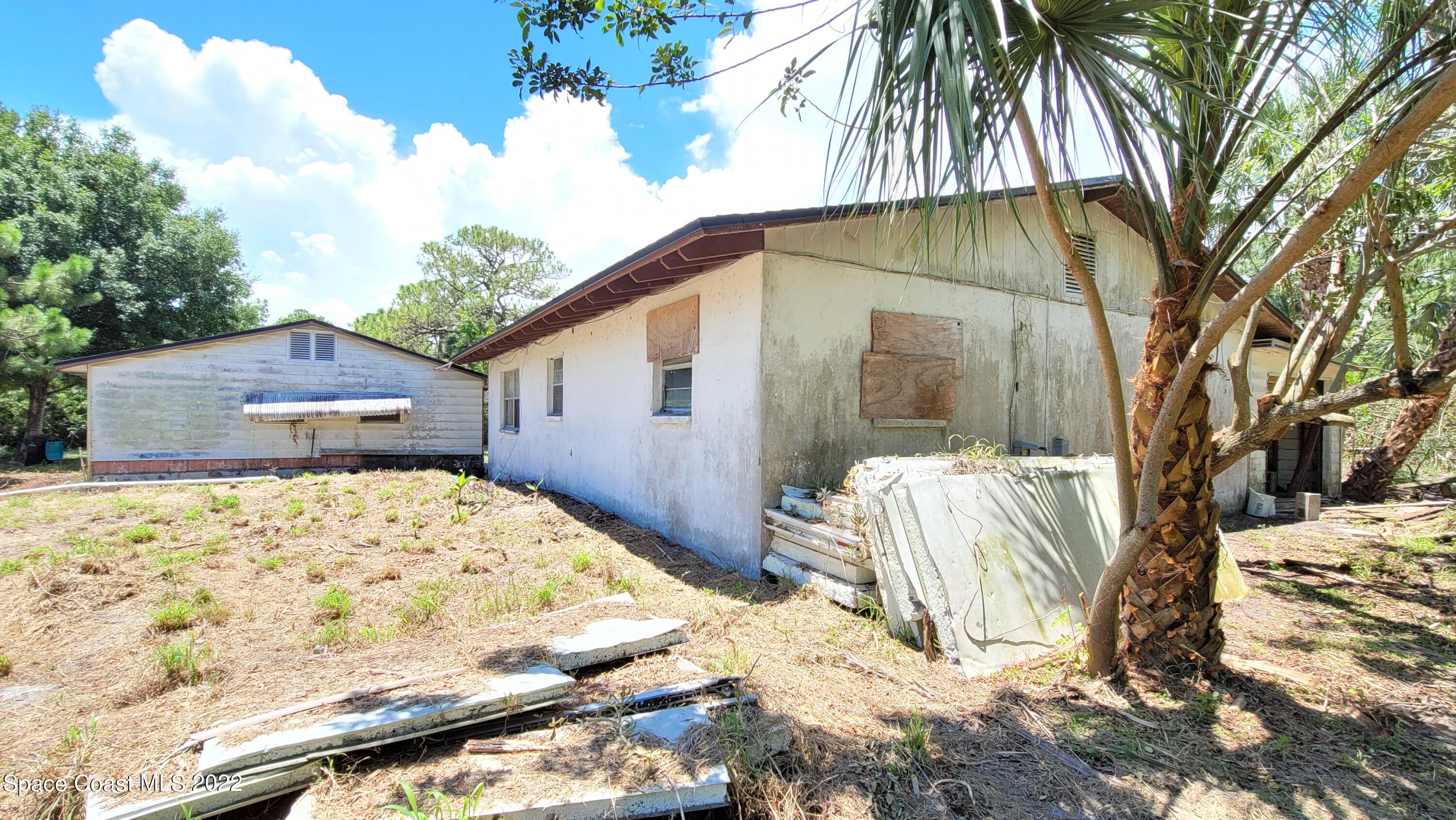 1910 Atz Road Malabar, FL 32950 - Photo 10 of 58 a view of backyard of the house