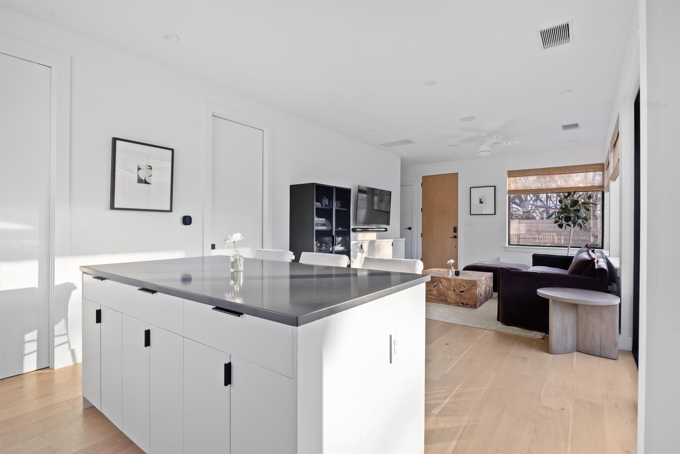 4604 South 2nd Street, Unit 2 Austin, TX 78745 - Photo 10 of 35 Room for dining table between island and living room, with prewired ceiling for light fixture.