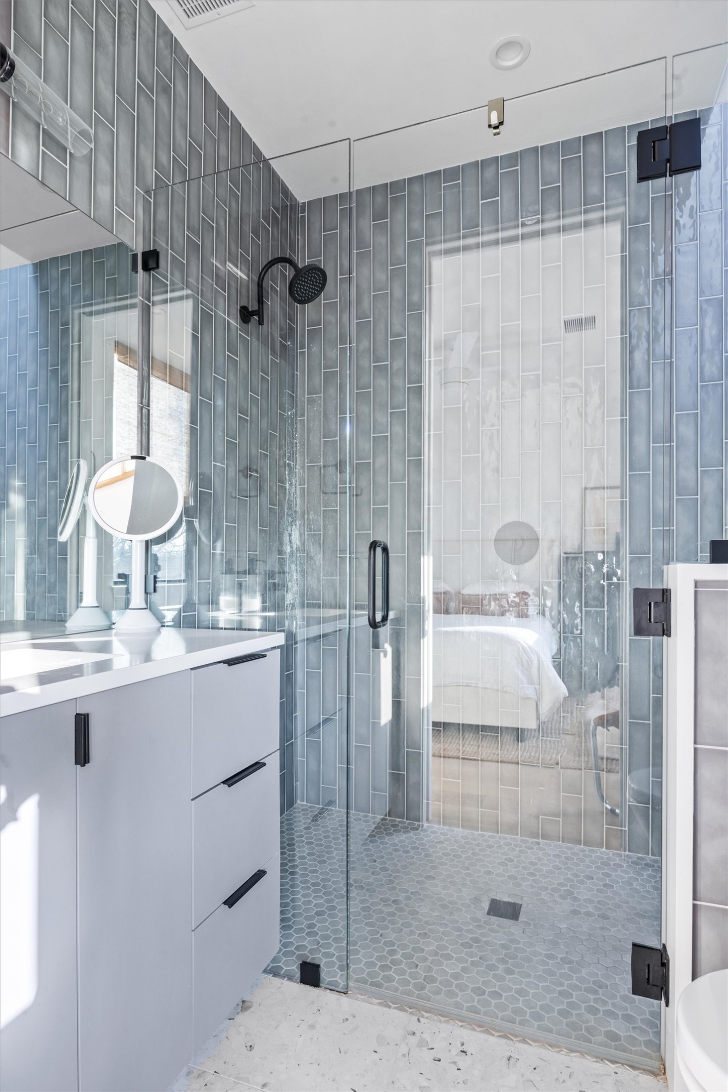 4604 South 2nd Street, Unit 2 Austin, TX 78745 - Photo 21 of 35 Full bathroom featuring vanity with coveted drawers, and a walk-in shower with seamless glass enclosure.