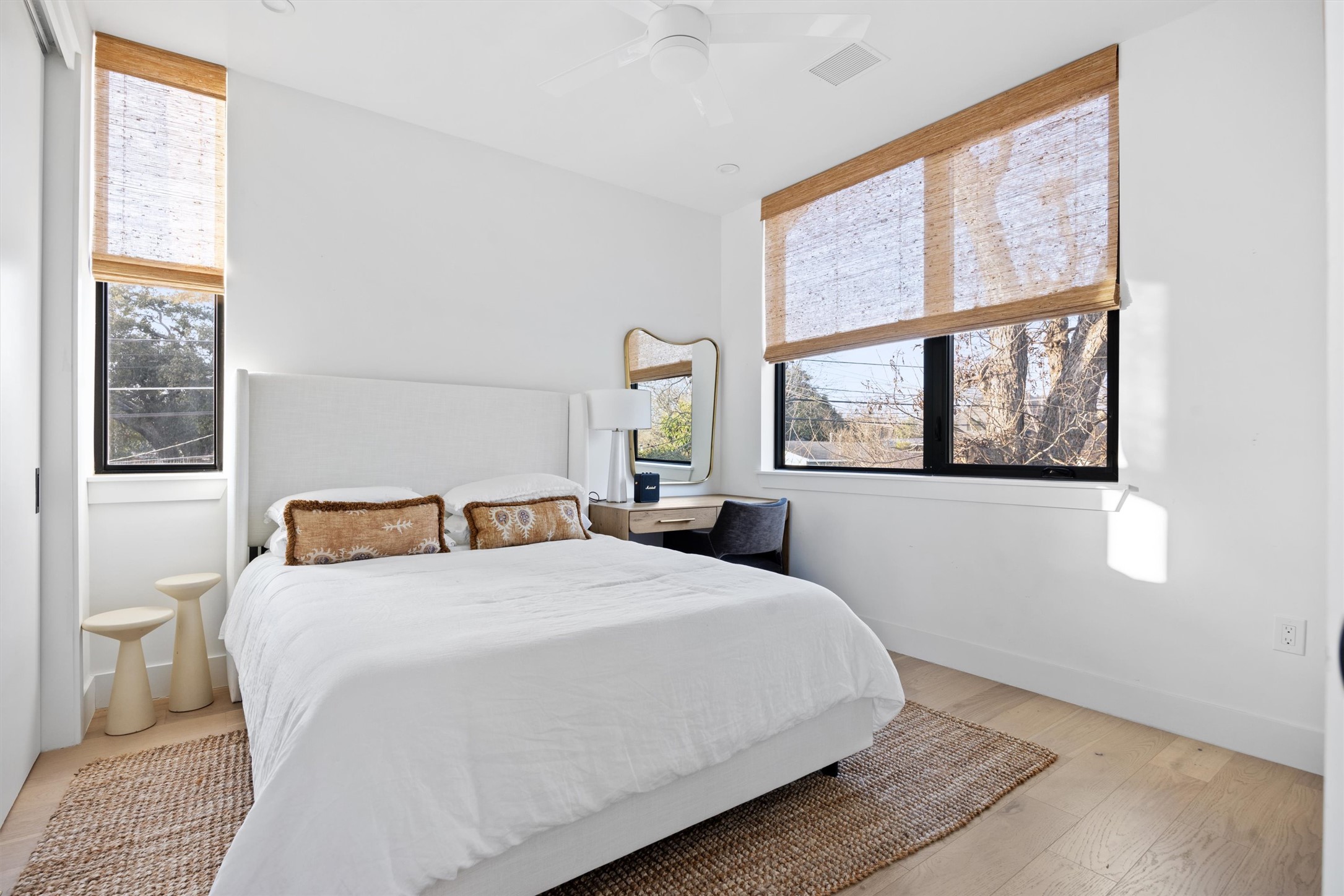 4604 South 2nd Street, Unit 2 Austin, TX 78745 - Photo 23 of 35 Back bedroom has great natural light and modern ceiling fan.