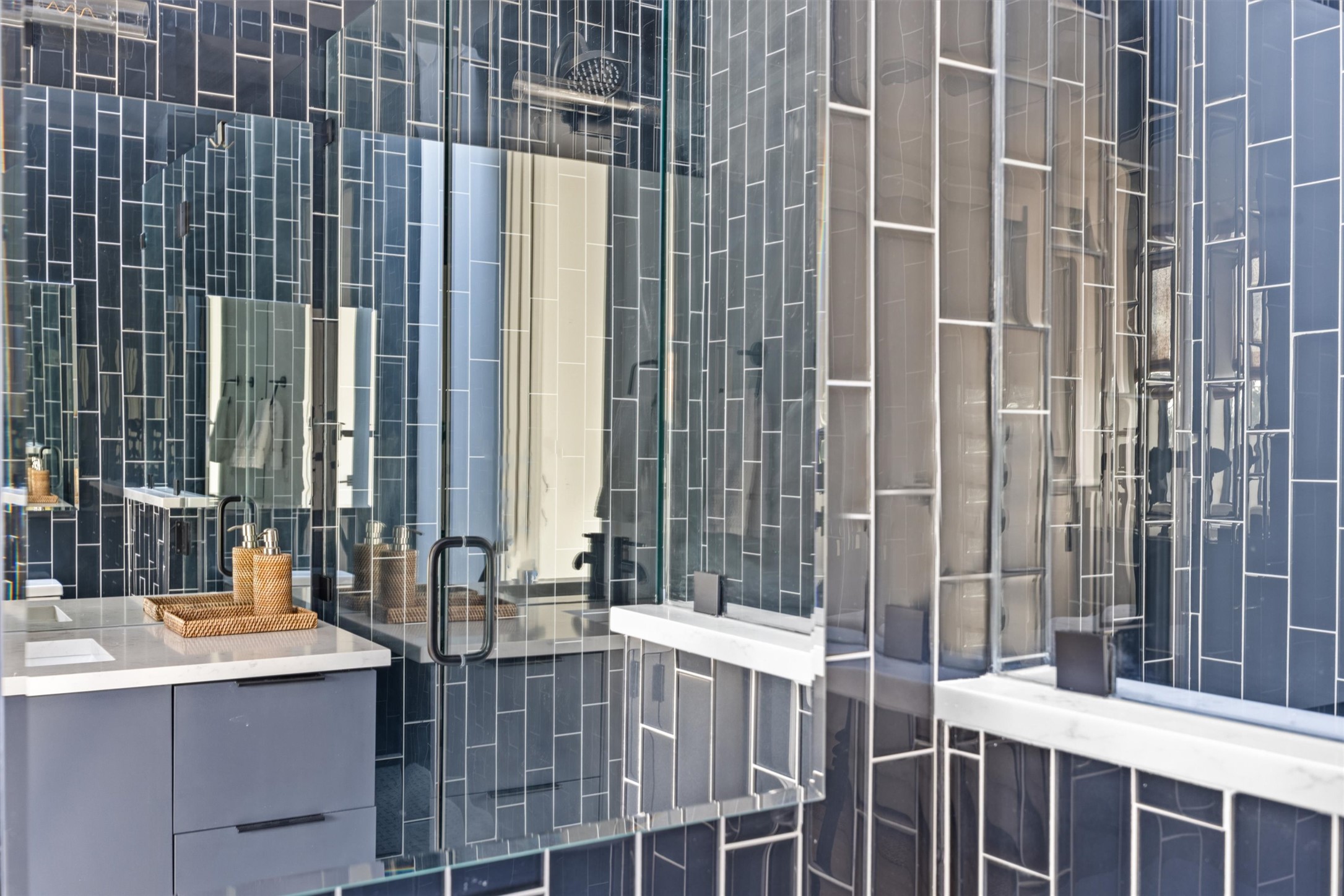 4604 South 2nd Street, Unit 2 Austin, TX 78745 - Photo 27 of 35 Modern vertical, floor-to-ceiling tile.