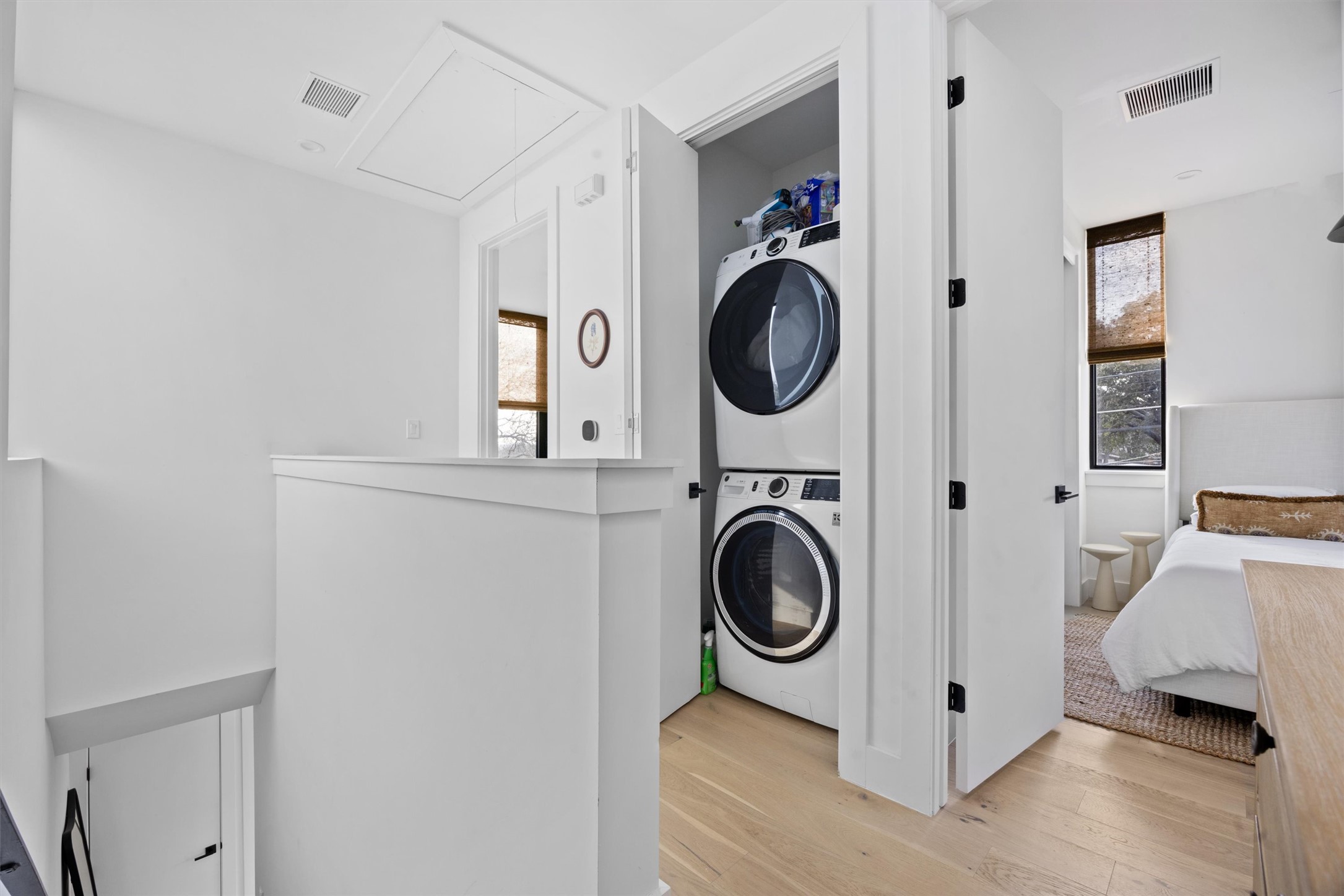 4604 South 2nd Street, Unit 2 Austin, TX 78745 - Photo 29 of 35 Laundry closet with stackable W/D in hall between the two bedrooms.