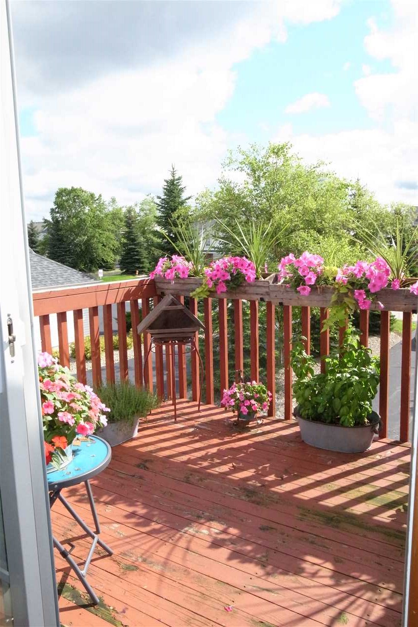 10192 Metalmark Lane, Unit 4 Roscoe, IL 61073 - Photo 14 of 16 a view of a fountain in front of a house
