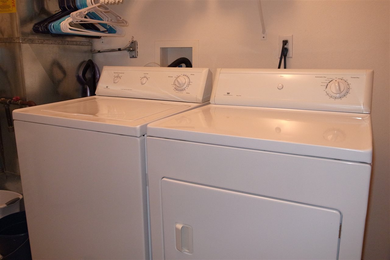 10192 Metalmark Lane, Unit 4 Roscoe, IL 61073 - Photo 15 of 16 a utility room with dryer and washer