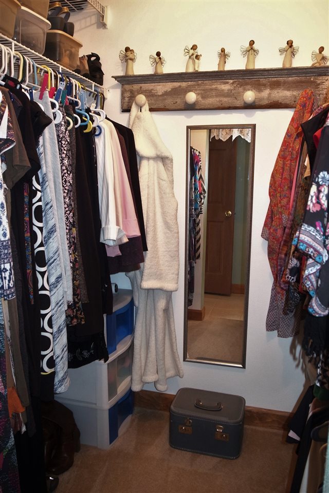 10192 Metalmark Lane, Unit 4 Roscoe, IL 61073 - Photo 8 of 16 a view of walk in closet with clothes and shoes