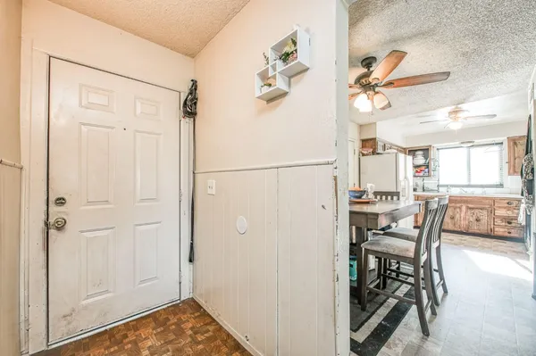 a view of a kitchen and dining room