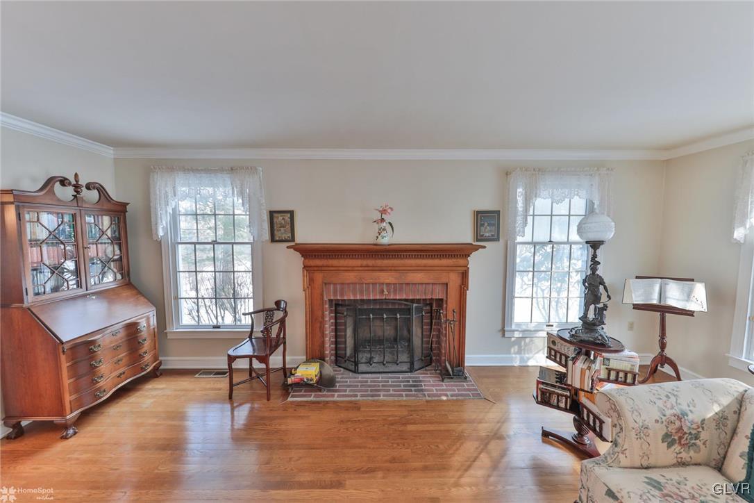 735 Texas Road Easton, PA 18042 - Photo 8 of 44 a living room with furniture and a fireplace