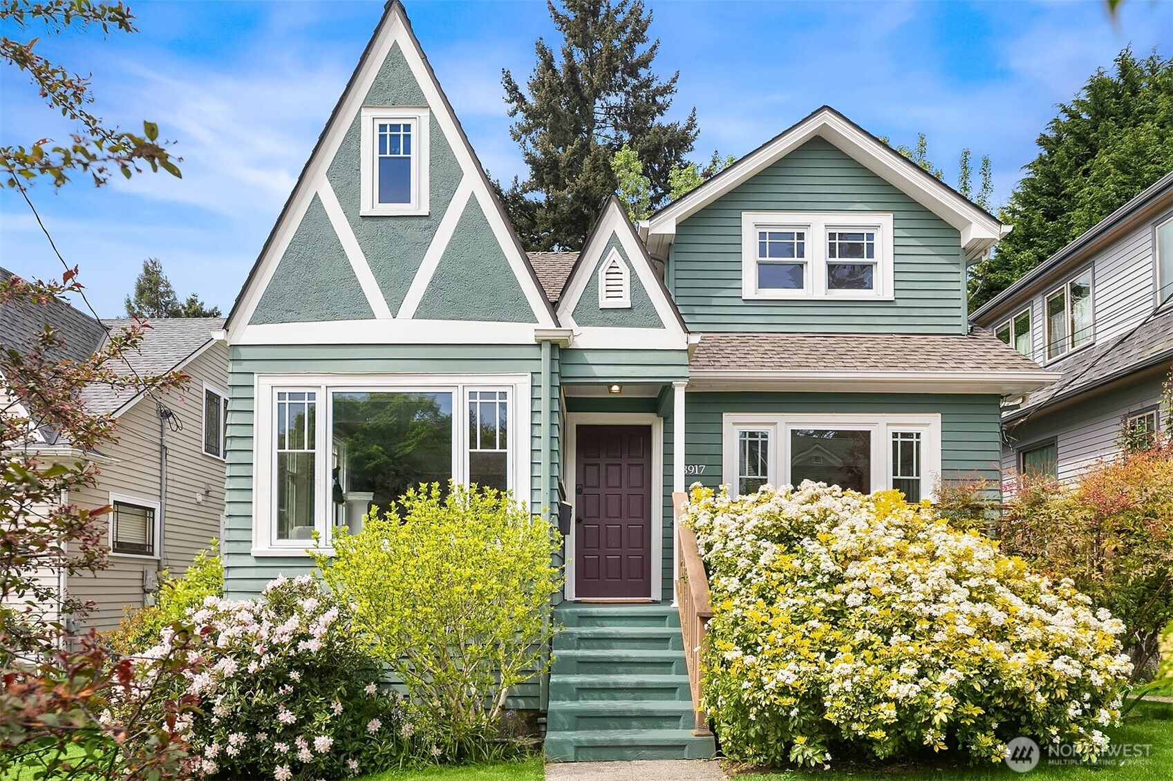 3917 Interlake Avenue North Seattle, WA 98103 - Photo 1 of 36 a front view of a house with garden