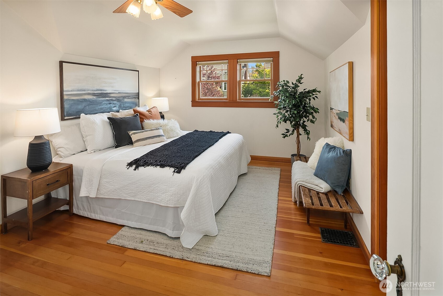 3917 Interlake Avenue North Seattle, WA 98103 - Photo 18 of 36 a bedroom with bed and a chair