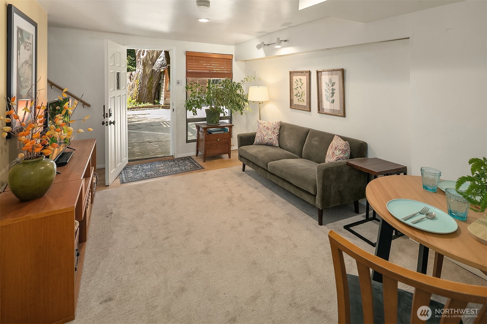 3917 Interlake Avenue North Seattle, WA 98103 - Photo 23 of 36 a living room with furniture and a potted plant