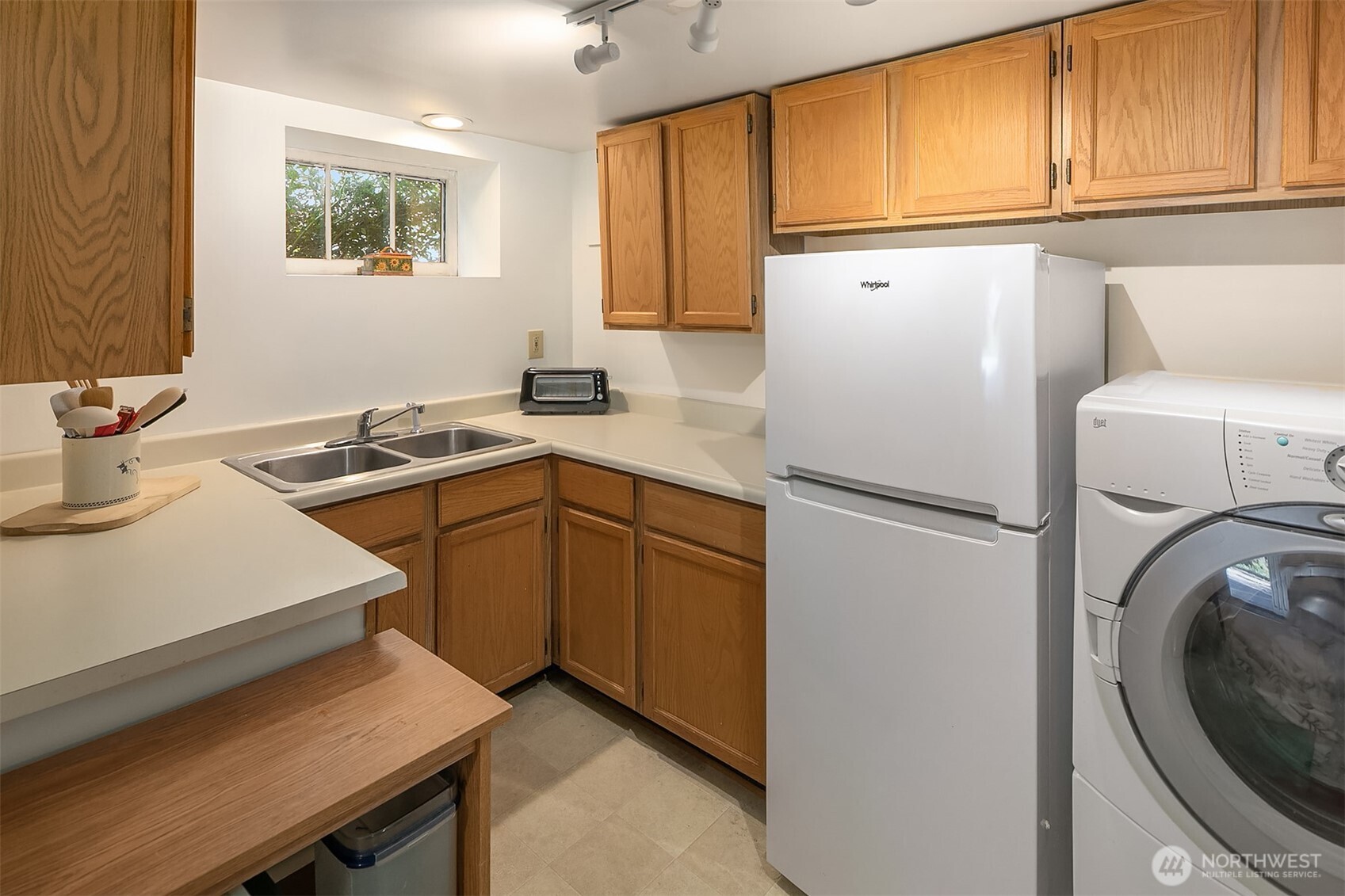 3917 Interlake Avenue North Seattle, WA 98103 - Photo 25 of 36 a kitchen with a refrigerator sink and stove