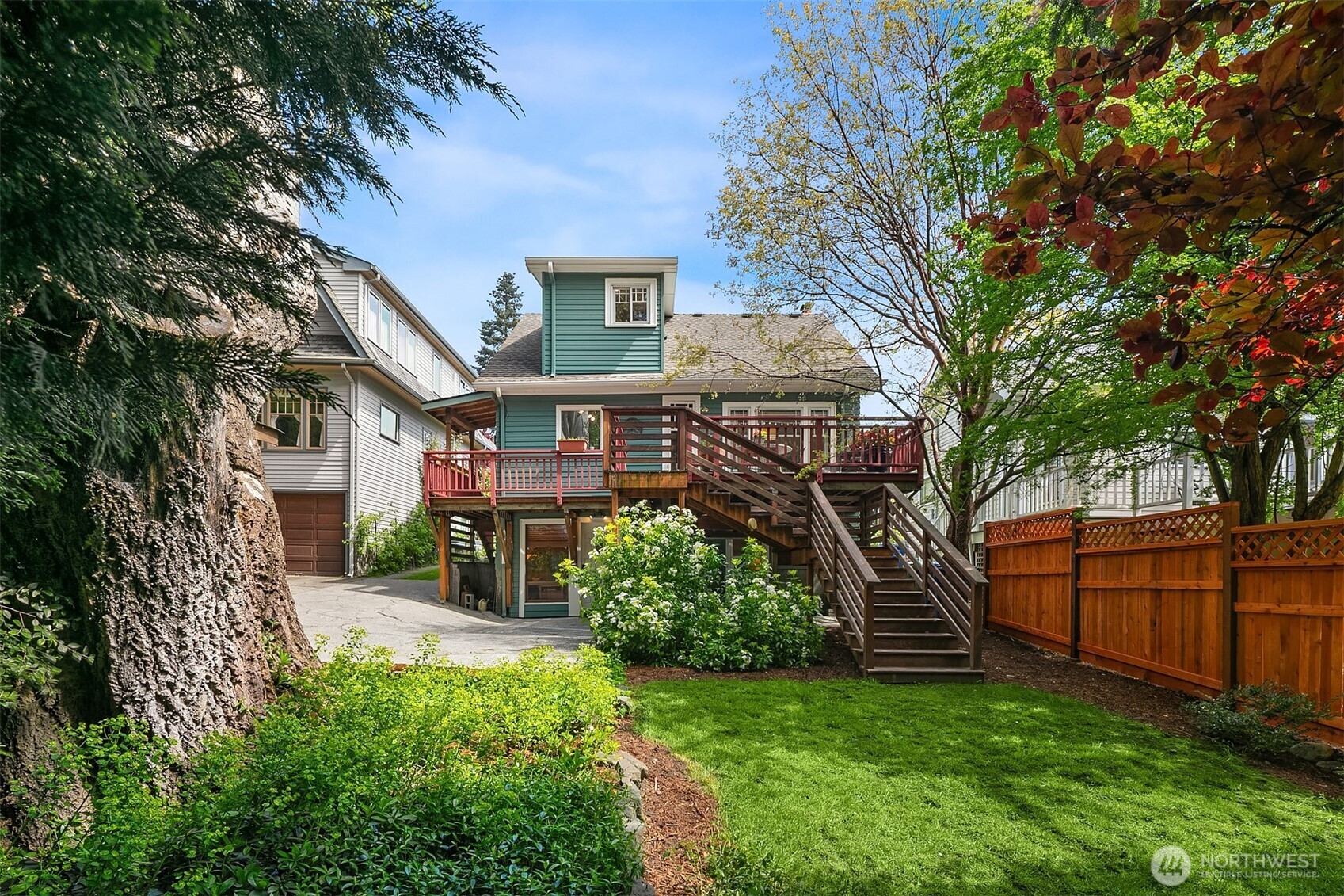 3917 Interlake Avenue North Seattle, WA 98103 - Photo 30 of 36 a front view of a house with garden