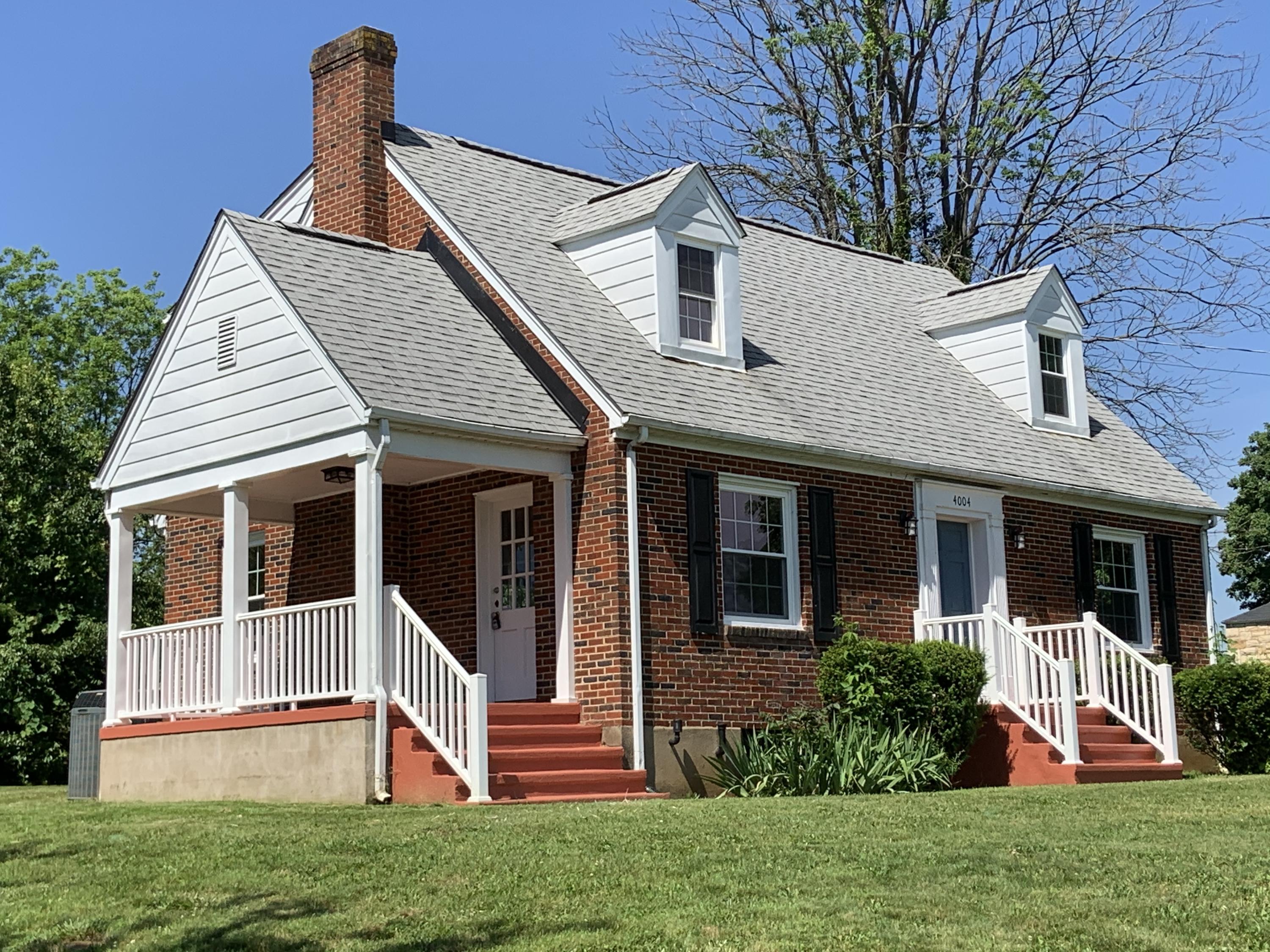 4004 Cove Road Roanoke, VA 24017 - Photo 2 of 30 a view of an house with backyard space and garden