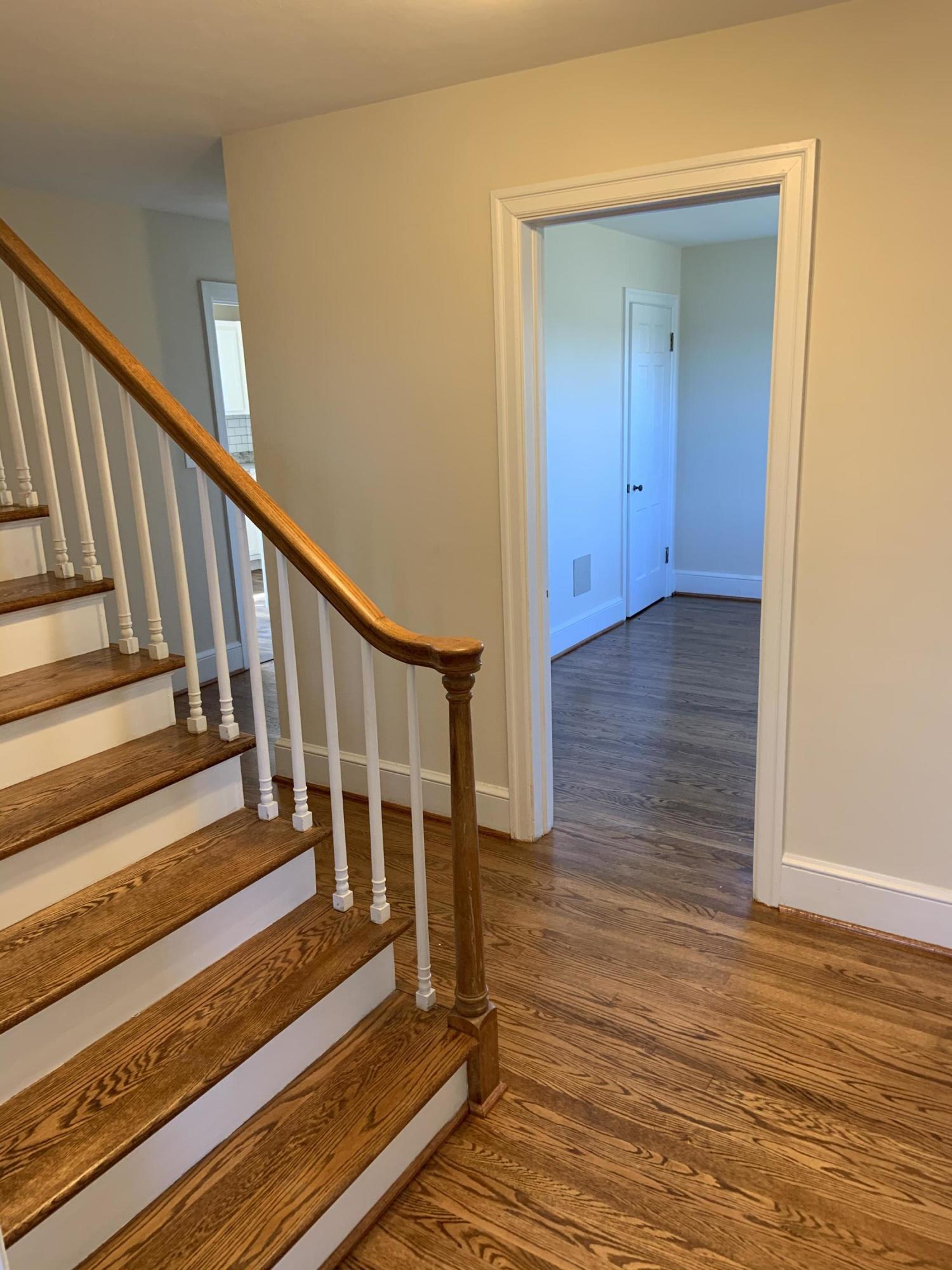 4004 Cove Road Roanoke, VA 24017 - Photo 18 of 30 a view of a hallway with wooden floor and staircase