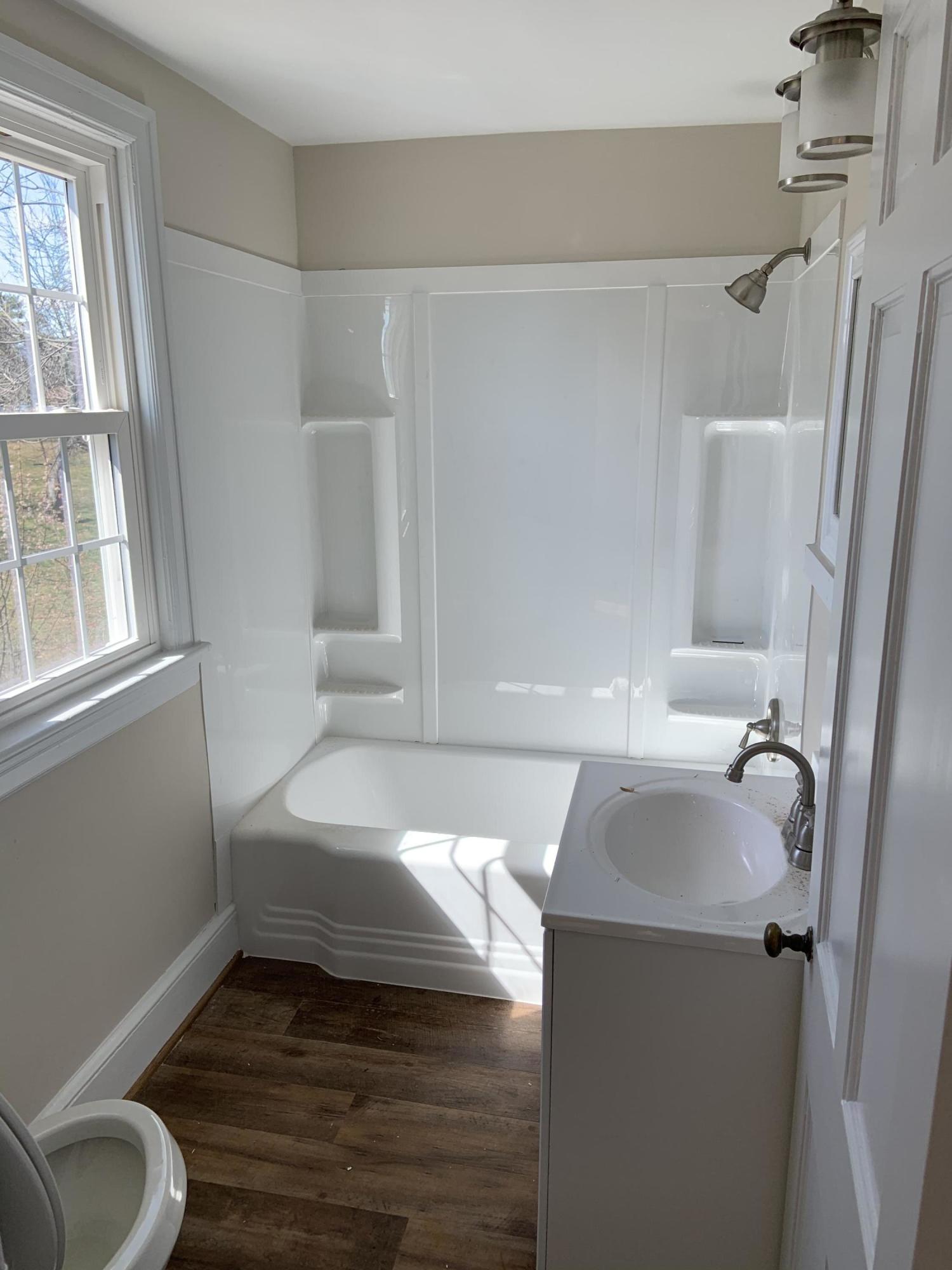 4004 Cove Road Roanoke, VA 24017 - Photo 20 of 30 a bathroom with a sink and a mirror