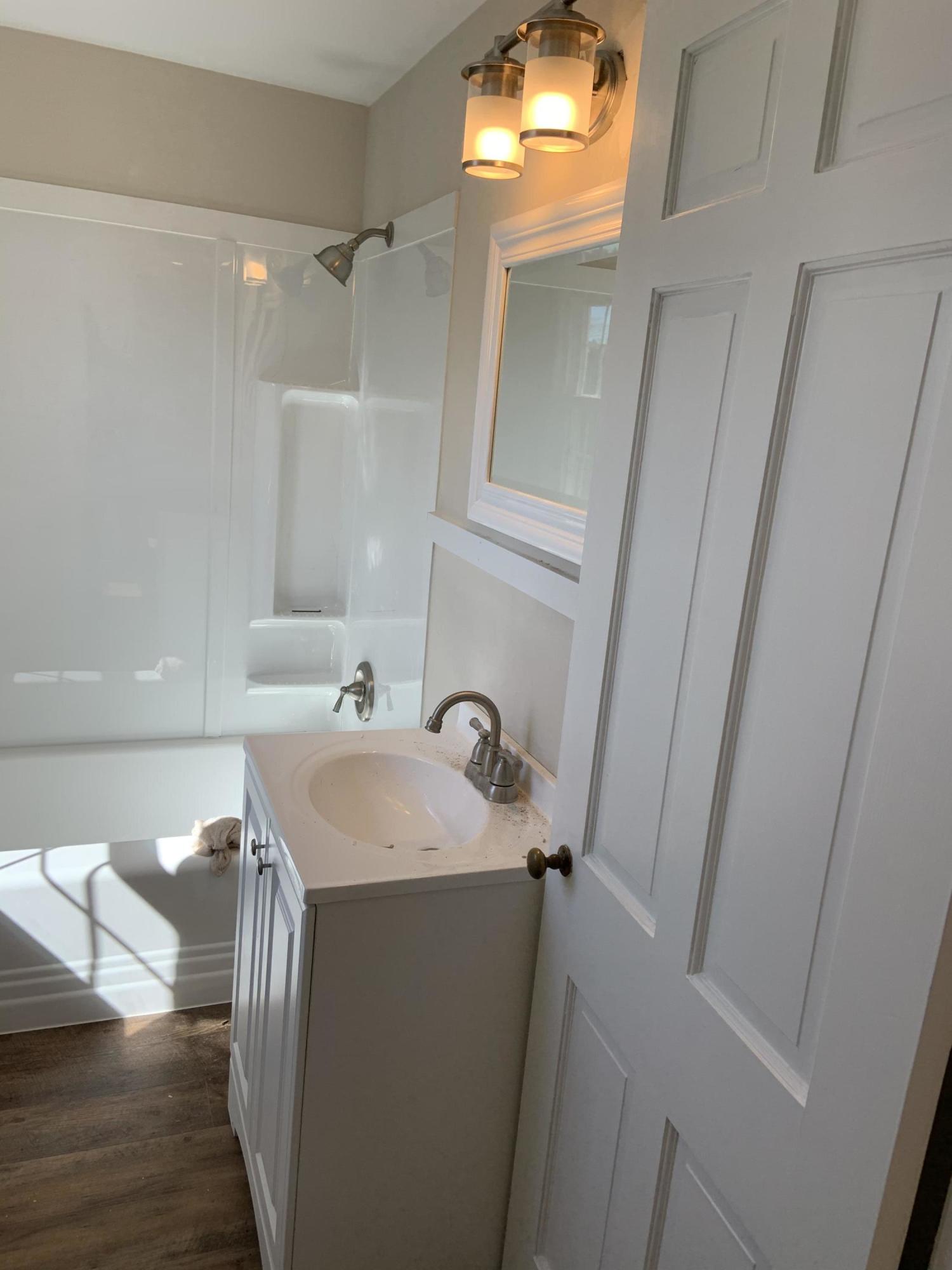 4004 Cove Road Roanoke, VA 24017 - Photo 21 of 30 a bathroom with a sink and a mirror