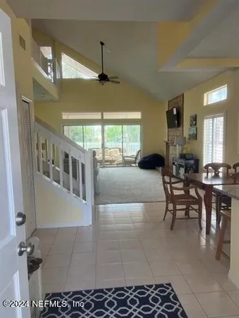 a lobby with furniture and window
