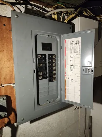 a bedroom with a bed and a mirror