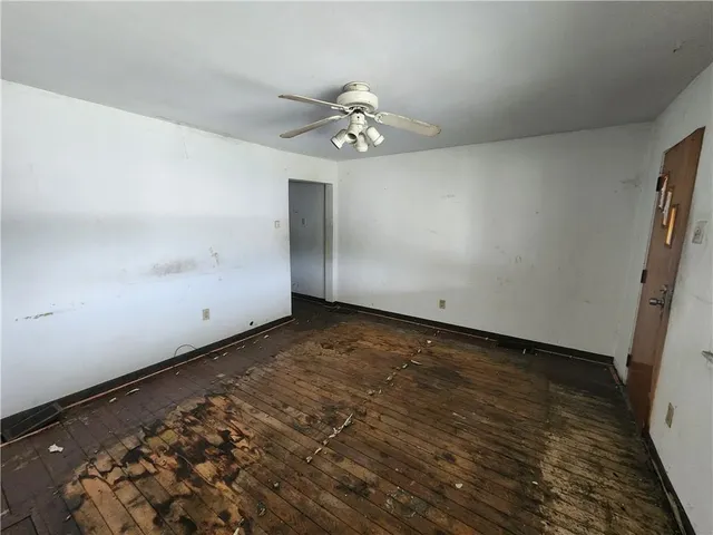 an empty room with windows
