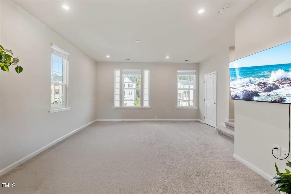 6620 Pathfinder Way Raleigh, NC 27616 - Photo 20 of 39 a view of an empty room with a window