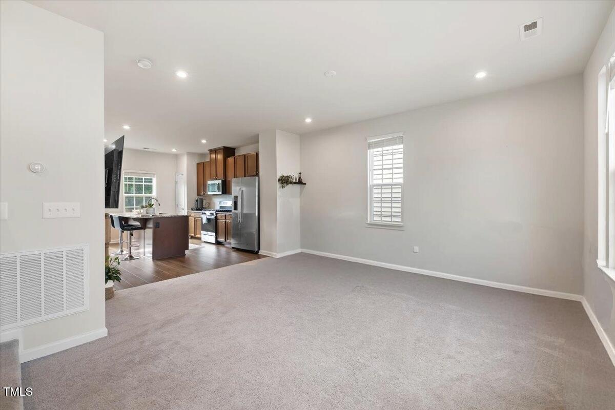 6620 Pathfinder Way Raleigh, NC 27616 - Photo 21 of 39 a view of a kitchen with a sink and a window