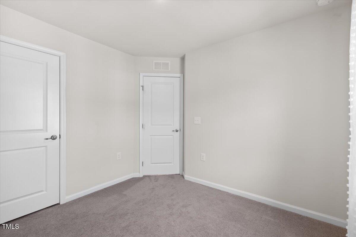 6620 Pathfinder Way Raleigh, NC 27616 - Photo 29 of 39 a view of an empty room