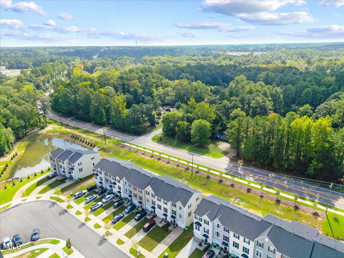 6620 Pathfinder Way Raleigh, NC 27616 - Photo 3 of 39 an aerial view of a house with a swimming pool patio and outdoor seating