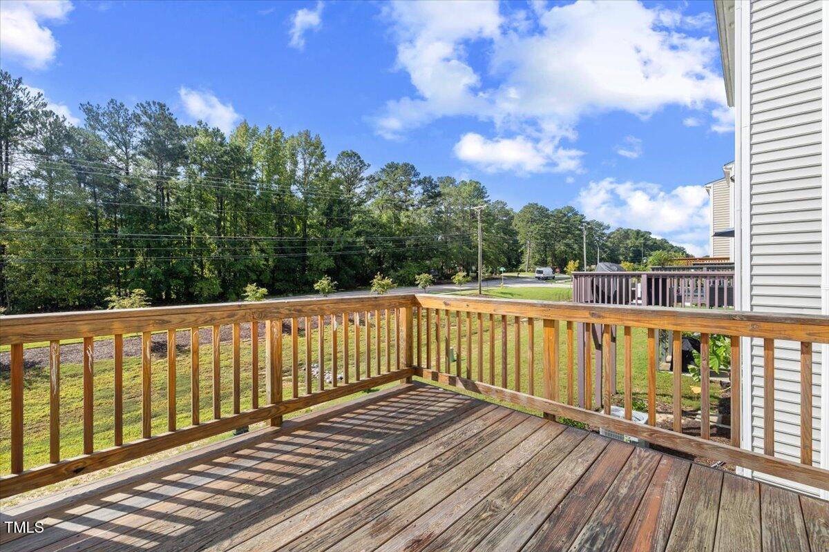 6620 Pathfinder Way Raleigh, NC 27616 - Photo 36 of 39 a view of wooden balcony with outdoor space