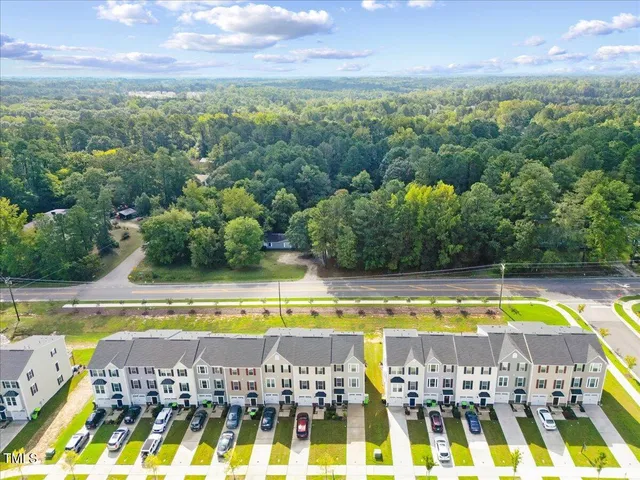 a view of a swimming pool with an outdoor space and seating area
