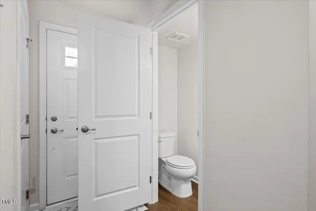 a bathroom with a toilet