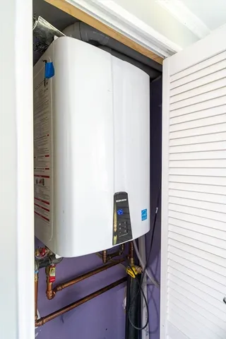 a view of swimming pool with lawn chairs and a yard