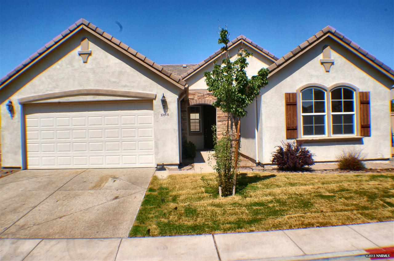 10678 Fire Poppy Circle Reno, NV 89521 - Photo 1 of 1 a front view of a house with a yard