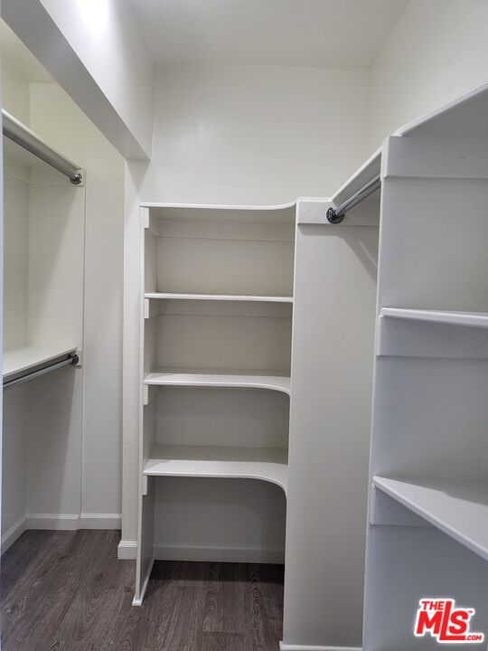 2754 West 12th Street Los Angeles, CA 90006 - Photo 7 of 17 a view of walk in closet with empty racks