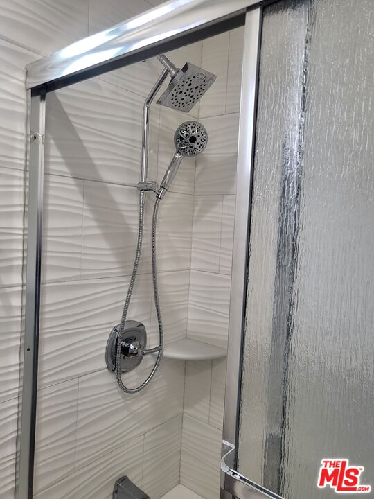 2754 West 12th Street Los Angeles, CA 90006 - Photo 9 of 17 a bathroom with a shower