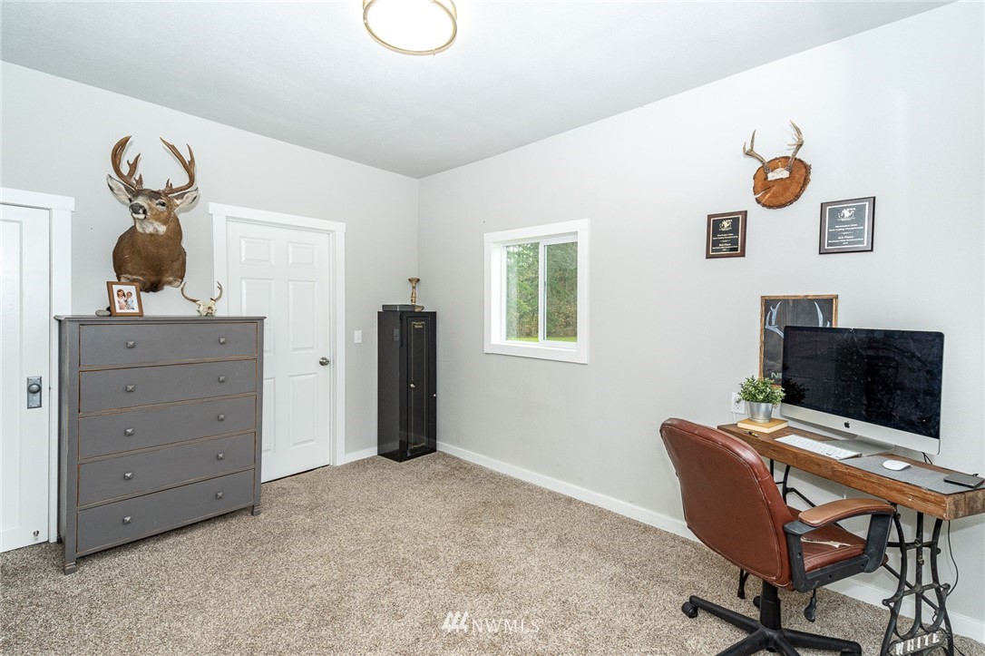 443 Tucker Road Toledo, WA 98591 - Photo 15 of 39 a view of a workspace with furniture