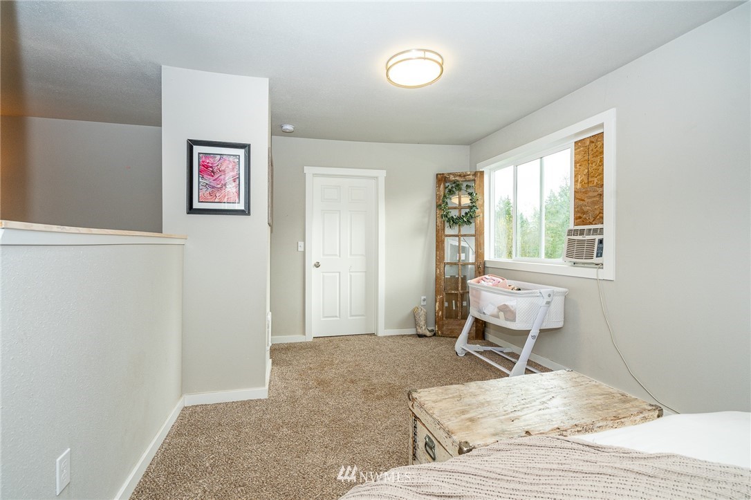 443 Tucker Road Toledo, WA 98591 - Photo 31 of 39 a living room with furniture and a window