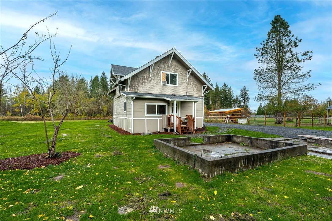 443 Tucker Road Toledo, WA 98591 - Photo 37 of 39 a view of a house with backyard and sitting area