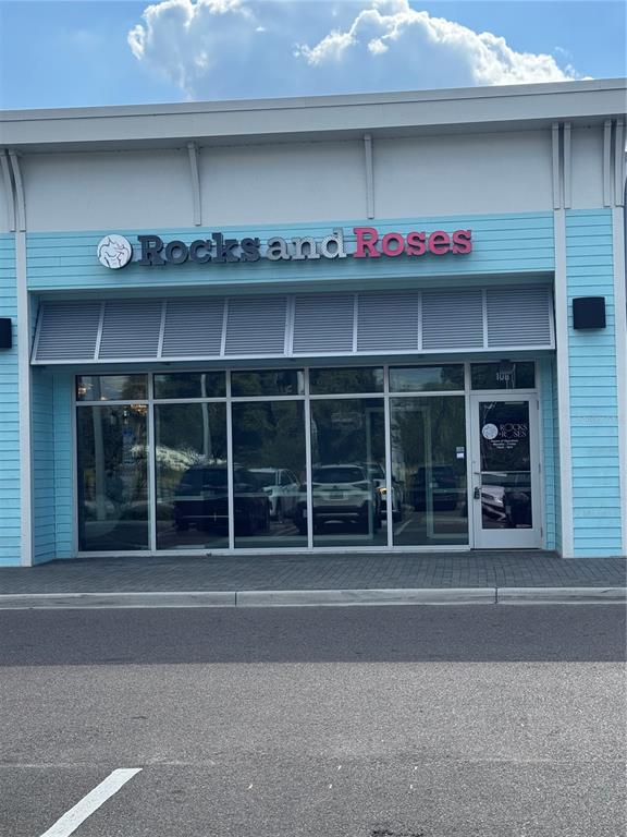 5113 Highway 674 Wimauma, FL 33598 - Photo 1 of 16 a front view of a house with a large window