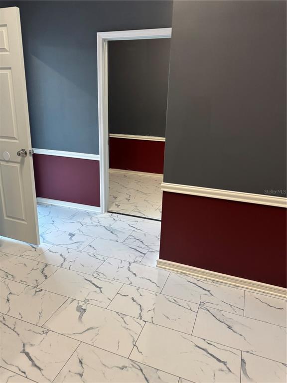 5113 Highway 674 Wimauma, FL 33598 - Photo 15 of 16 a view of wooden floor