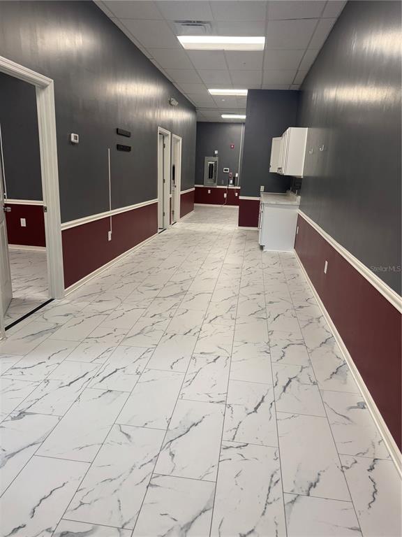 5113 Highway 674 Wimauma, FL 33598 - Photo 16 of 16 a large bathroom with a sink and a mirror